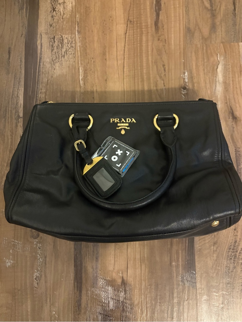 Prada Black Leather Duffel with Gold Hardware